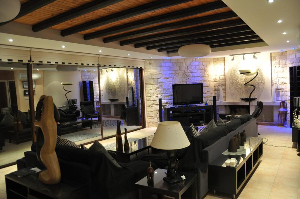 Posezení v ubytování Oceania & Panorama Villas
