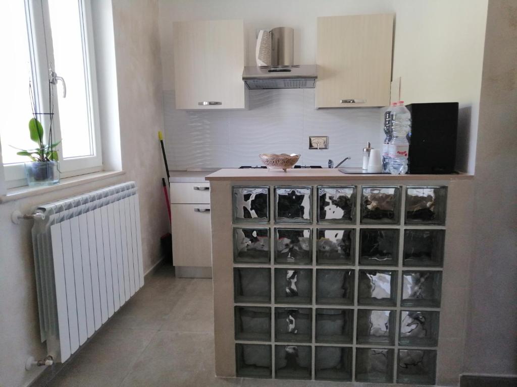 Kuchyň nebo kuchyňský kout v ubytování Bed and Breakfast Mezzanotte