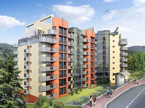 a rendering of a building with people walking in front of it at Holiday Apartments in Krynica Zdrój