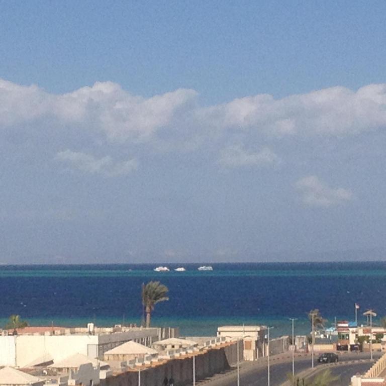 a view of the ocean with boats in the water at Sweet Home Flat 2 in Hurghada
