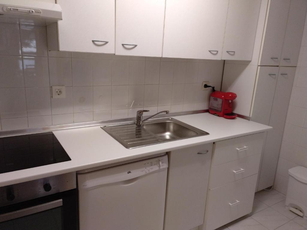 Kuchyň nebo kuchyňský kout v ubytování APARTAMENTO BRAZATO