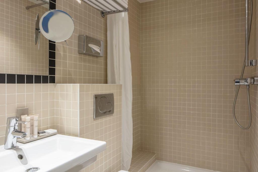 Ванна кімната в Hotel Palm - Astotel