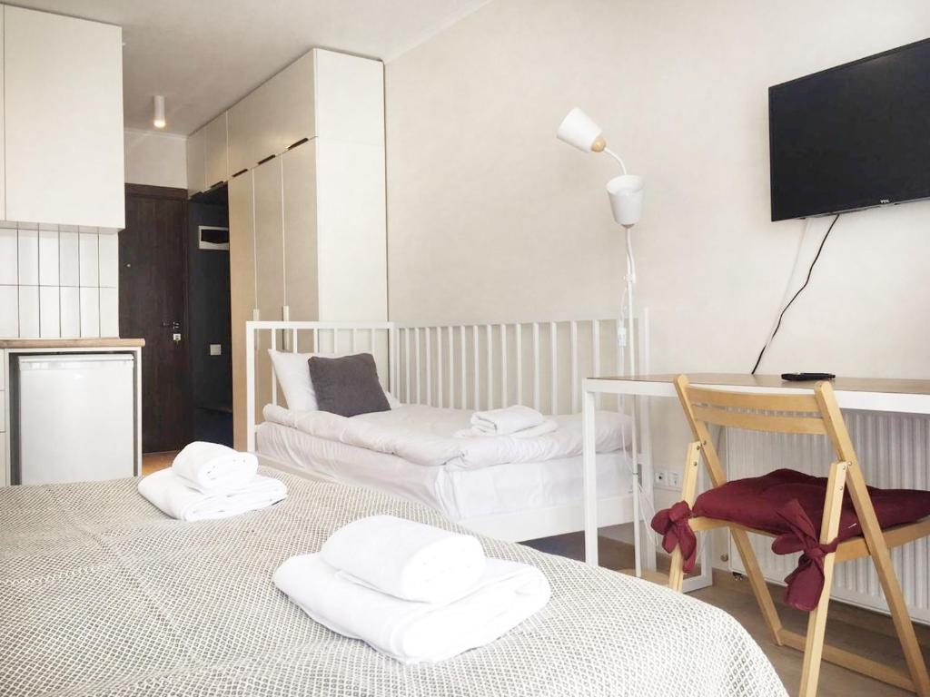 Postel nebo postele na pokoji v ubytování Sunny Days Gudauri