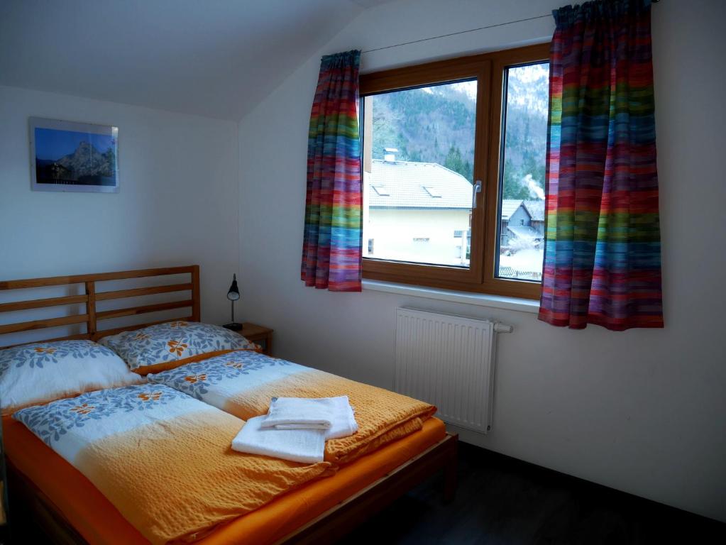 Postel nebo postele na pokoji v ubytování Apartment Obertraun