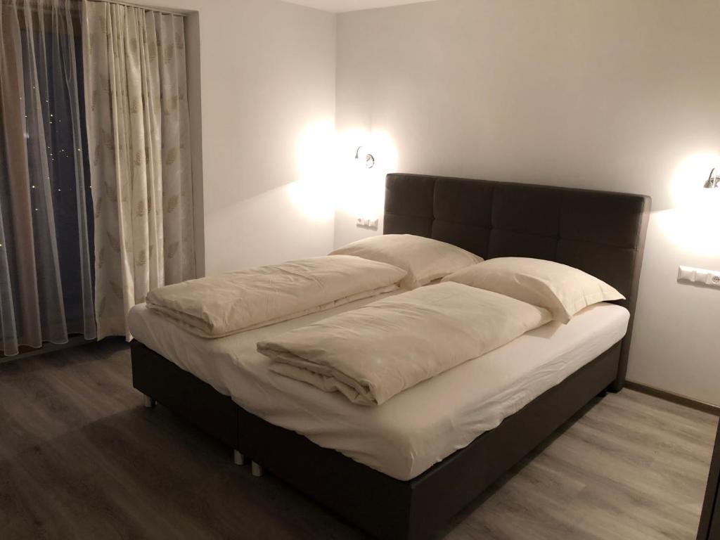 Postel nebo postele na pokoji v ubytování Assingerhof