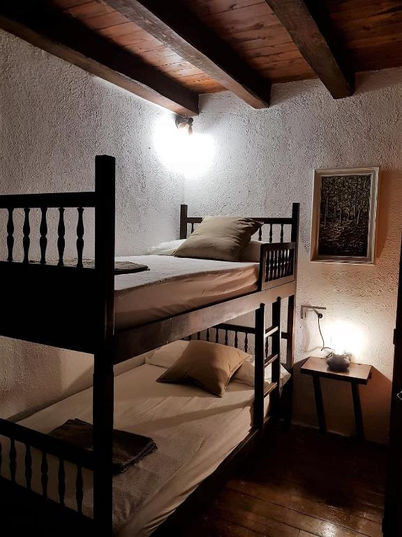 Posteľ alebo postele v izbe v ubytovaní Casa de la Font de Dalt