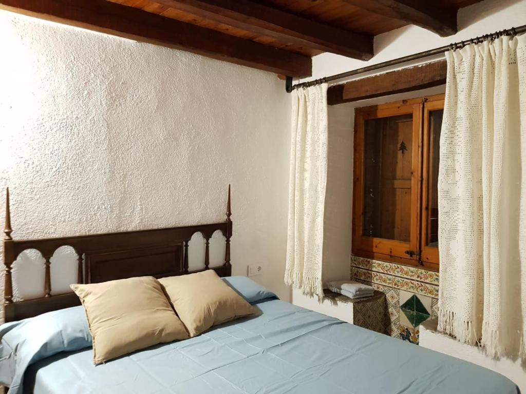 Posteľ alebo postele v izbe v ubytovaní Casa de la Font de Dalt
