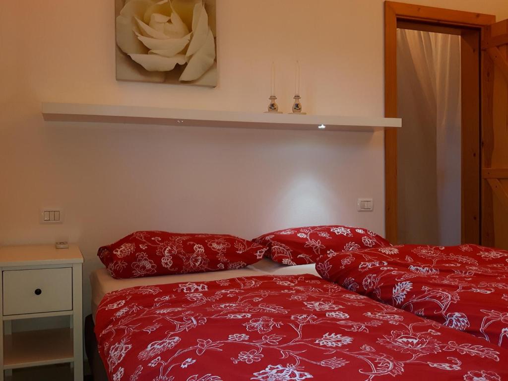 Postel nebo postele na pokoji v ubytování Villa I Tamarigi