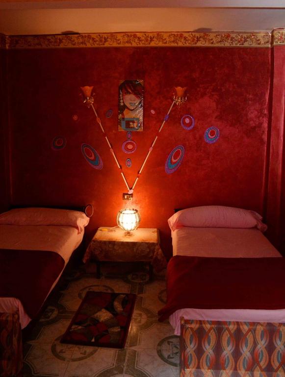 Postel nebo postele na pokoji v ubytování City Hostel