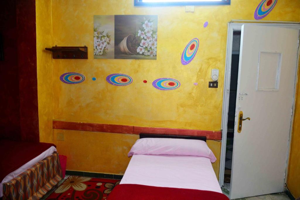 Postel nebo postele na pokoji v ubytování City Hostel