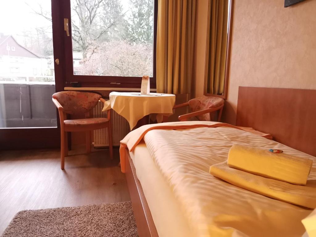 Postel nebo postele na pokoji v ubytování Hotel zur Schmiede