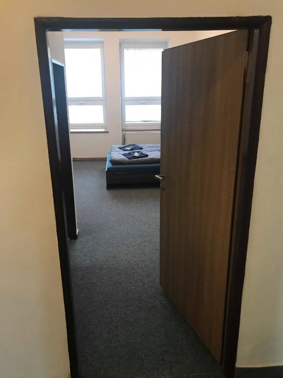 Postel nebo postele na pokoji v ubytování Penzion malých pivovarů
