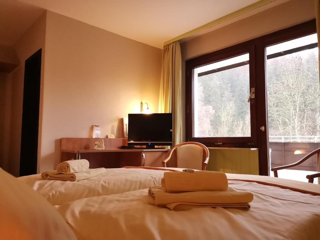 Postel nebo postele na pokoji v ubytování Hotel zur Schmiede