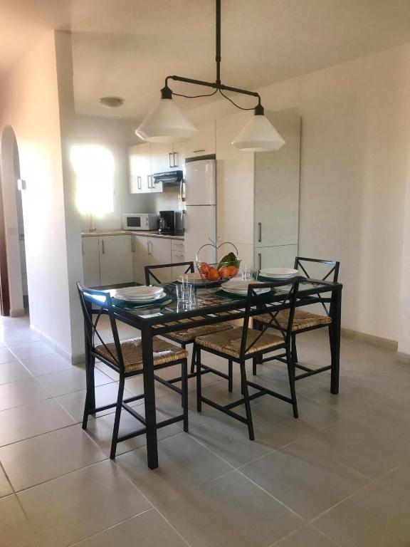 Kuchyň nebo kuchyňský kout v ubytování Medano Beach Villas