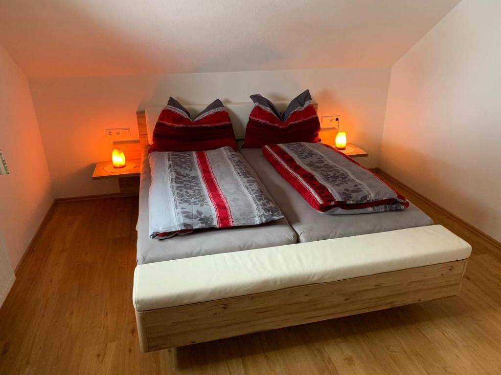 Postel nebo postele na pokoji v ubytování Hochkirg Lehen