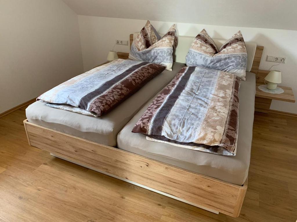 Postel nebo postele na pokoji v ubytování Hochkirg Lehen