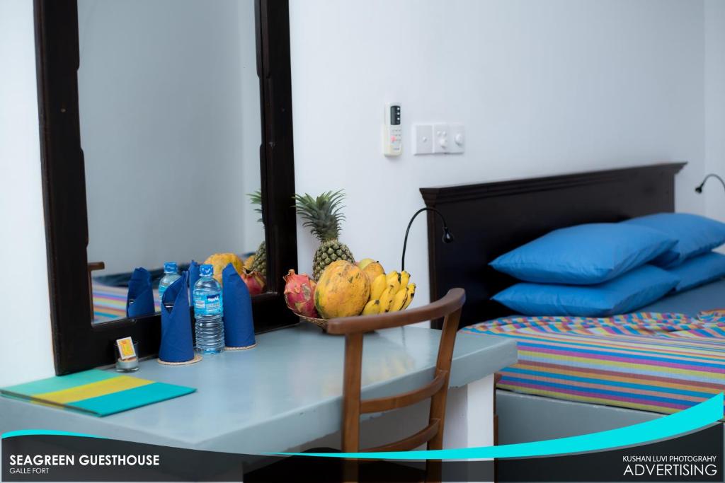 Postel nebo postele na pokoji v ubytování Seagreen Guesthouse - Galle Fort