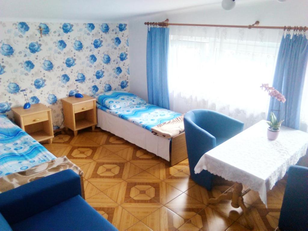 Posteľ alebo postele v izbe v ubytovaní Willa Danuta
