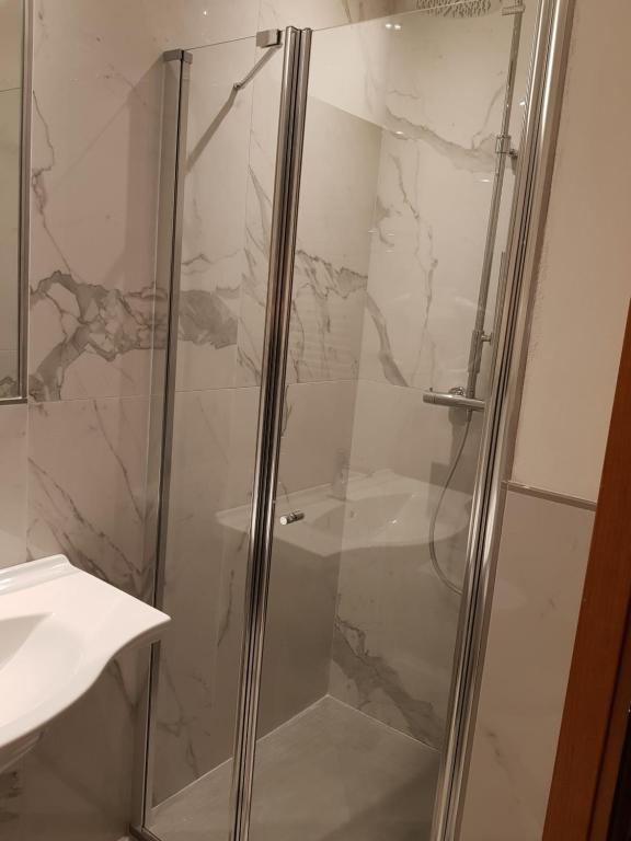 Koupelna v ubytování Hotel Moena