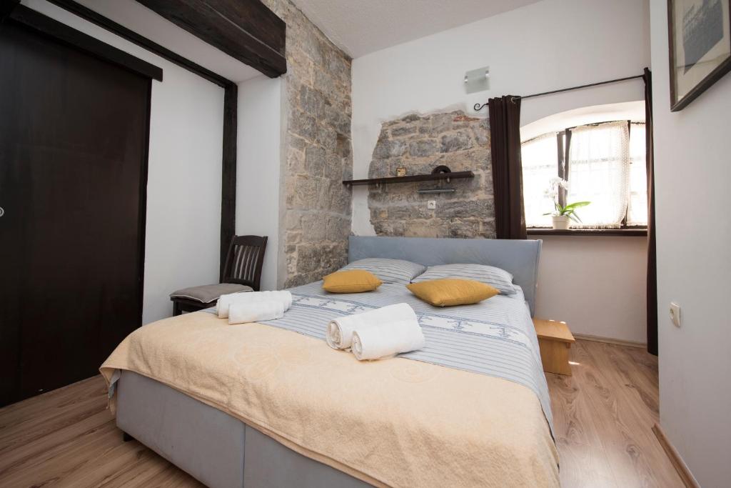 Postel nebo postele na pokoji v ubytování Elena Rooms