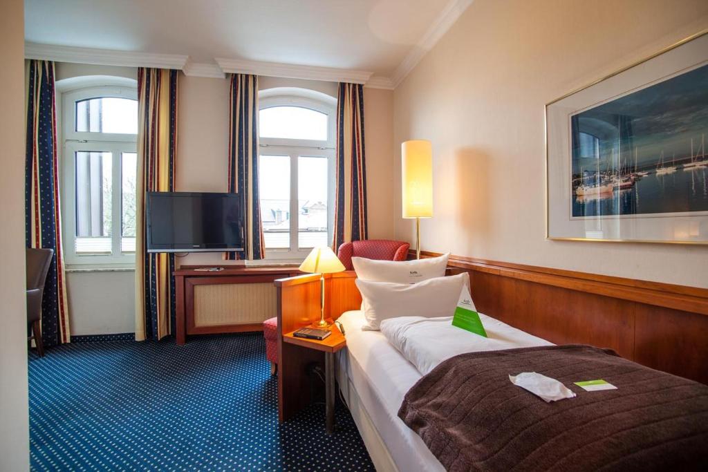 Voodi või voodid majutusasutuse HOTEL DÜNENLÄUFER Langeoog toas