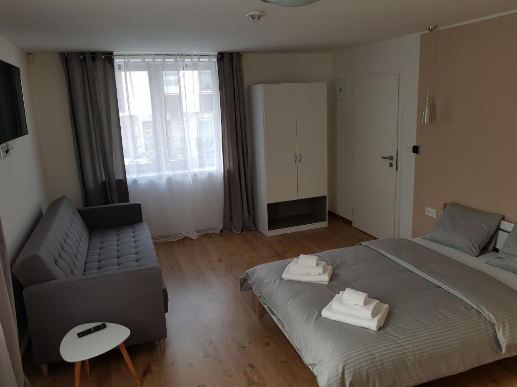 Postel nebo postele na pokoji v ubytování Apartmány Pec pod Sněžkou