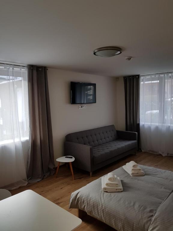 Postel nebo postele na pokoji v ubytování Apartmány Pec pod Sněžkou