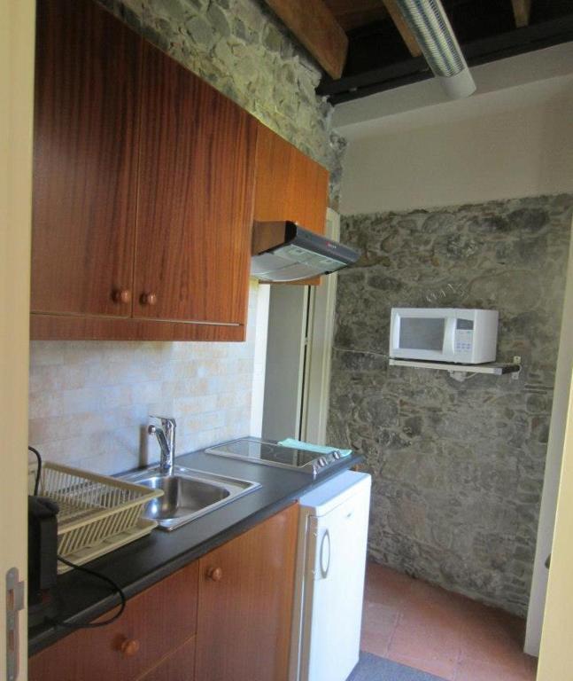 Kuchyň nebo kuchyňský kout v ubytování Ayios Andronikos Agrotourism House