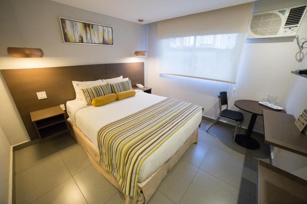 Postel nebo postele na pokoji v ubytování Hotel Ojos Del Rio