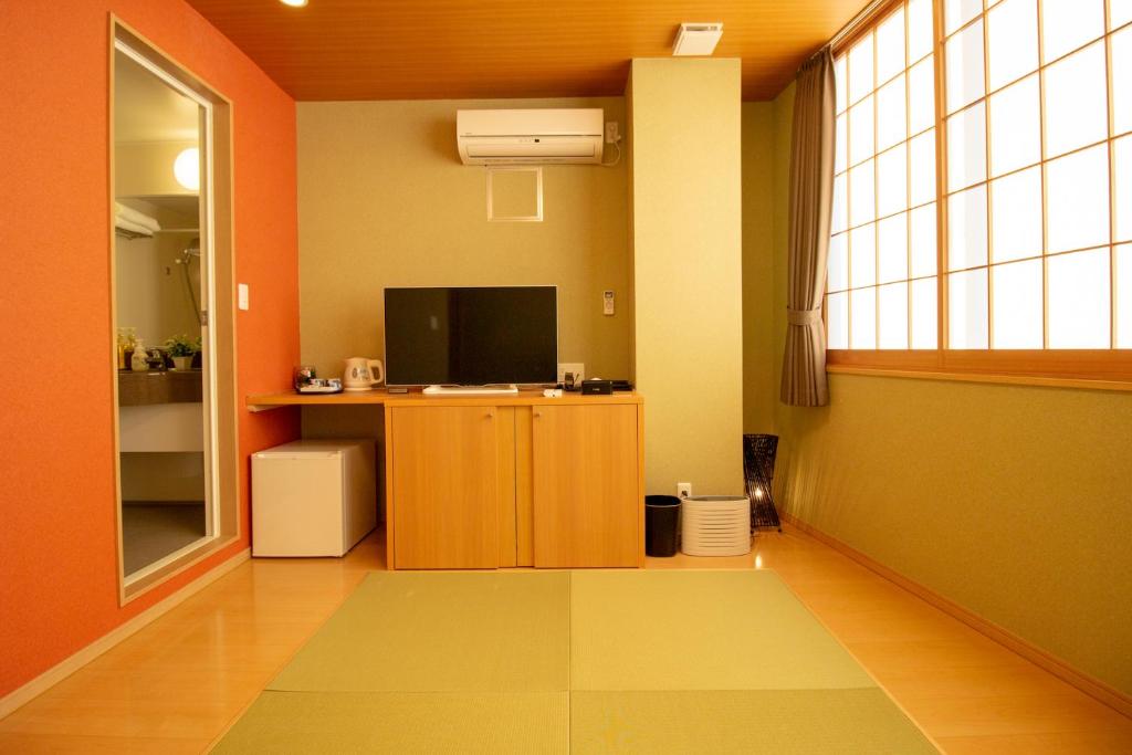 TV a/nebo společenská místnost v ubytování Nagomi Hotel Nippori
