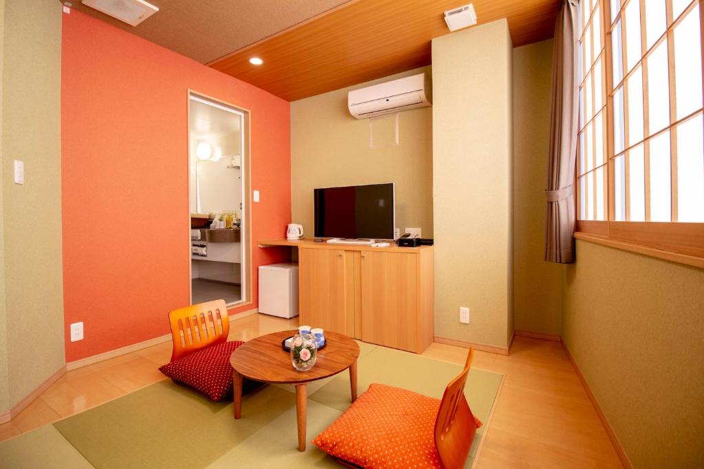 TV a/nebo společenská místnost v ubytování Nagomi Hotel Nippori