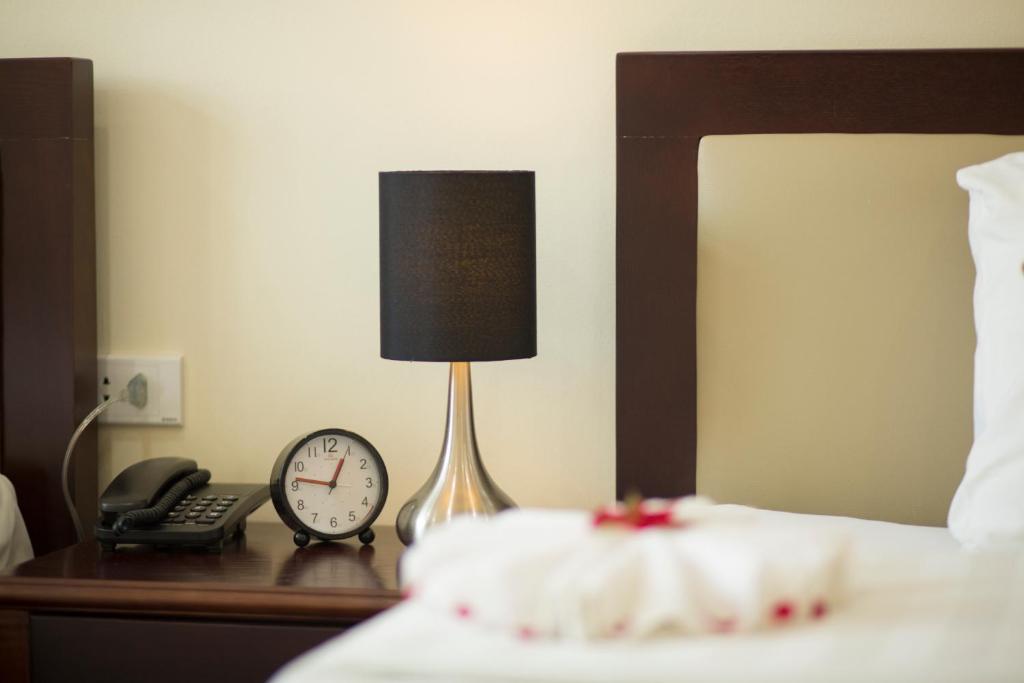 Postel nebo postele na pokoji v ubytování Spoon Hotel