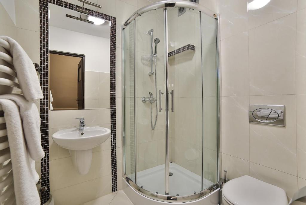 Kúpeľňa v ubytovaní Apartamenty Kościelisko
