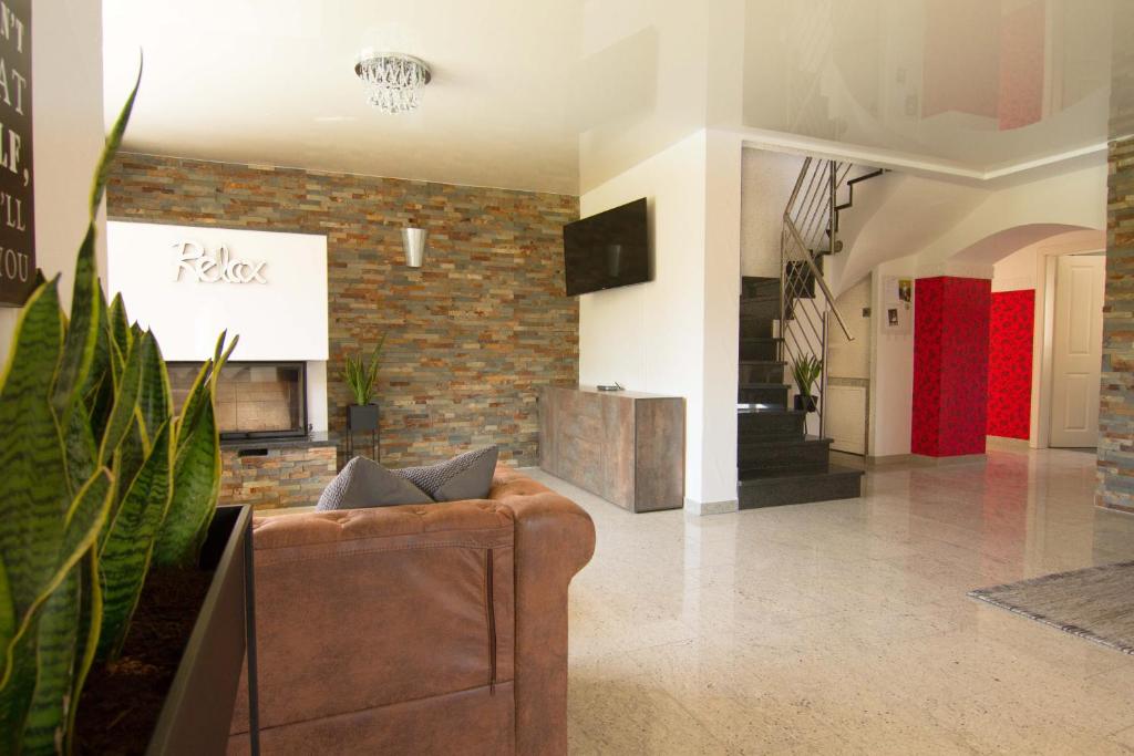 TV a/nebo společenská místnost v ubytování Rust-Fewo-Hotel