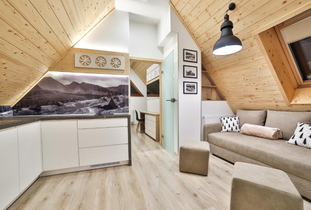 Kuchyňa alebo kuchynka v ubytovaní Apartamenty Kościelisko