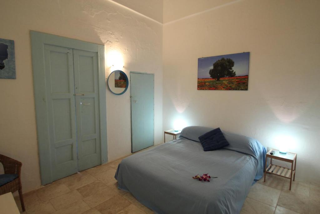 Postel nebo postele na pokoji v ubytování Masseria Pugliese Farm