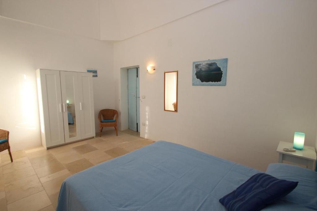 Postel nebo postele na pokoji v ubytování Masseria Pugliese Farm