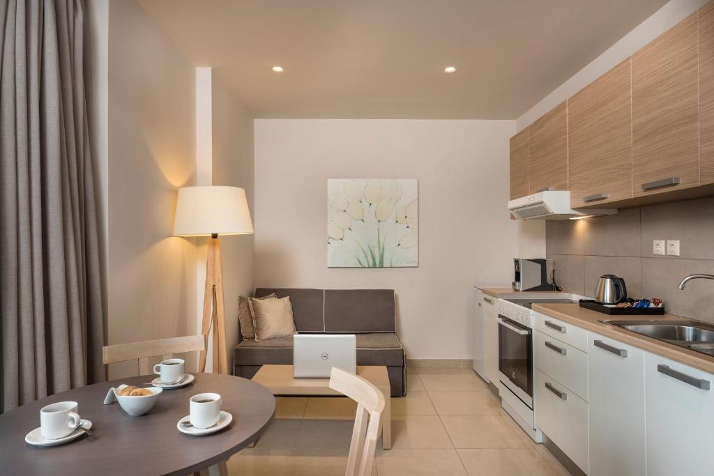 Kuchyňa alebo kuchynka v ubytovaní Trianon Luxury Apartments & Suites
