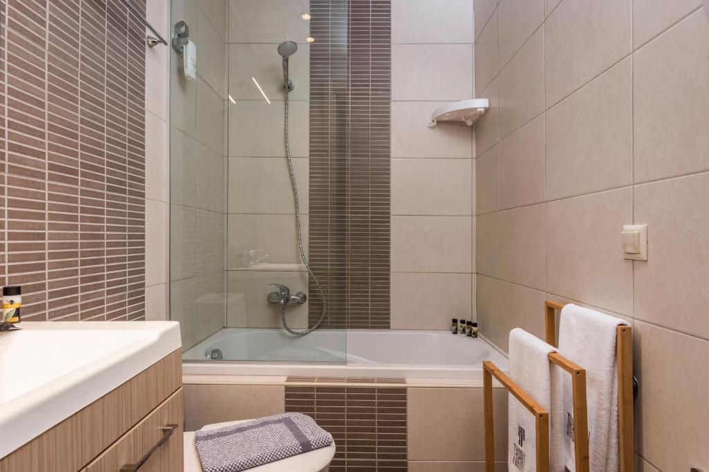 Kúpeľňa v ubytovaní Trianon Luxury Apartments & Suites