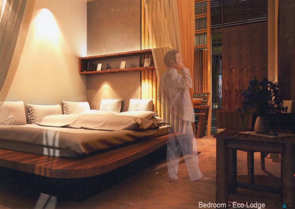 Postel nebo postele na pokoji v ubytování Ecolodge Bukit Lawang - Hotel&JungleTREK