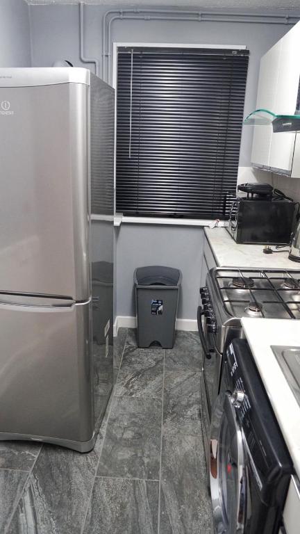 Kuchyň nebo kuchyňský kout v ubytování North London Apartment - Edmonton