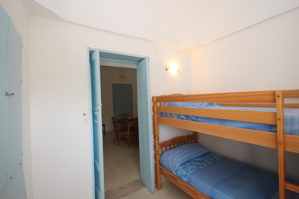 Postel nebo postele na pokoji v ubytování Masseria Pugliese Farm