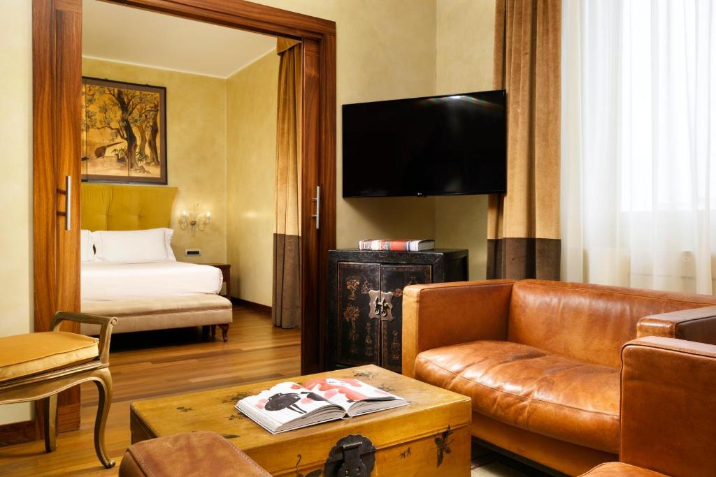 TV a/nebo společenská místnost v ubytování Enterprise Hotel Design & Boutique