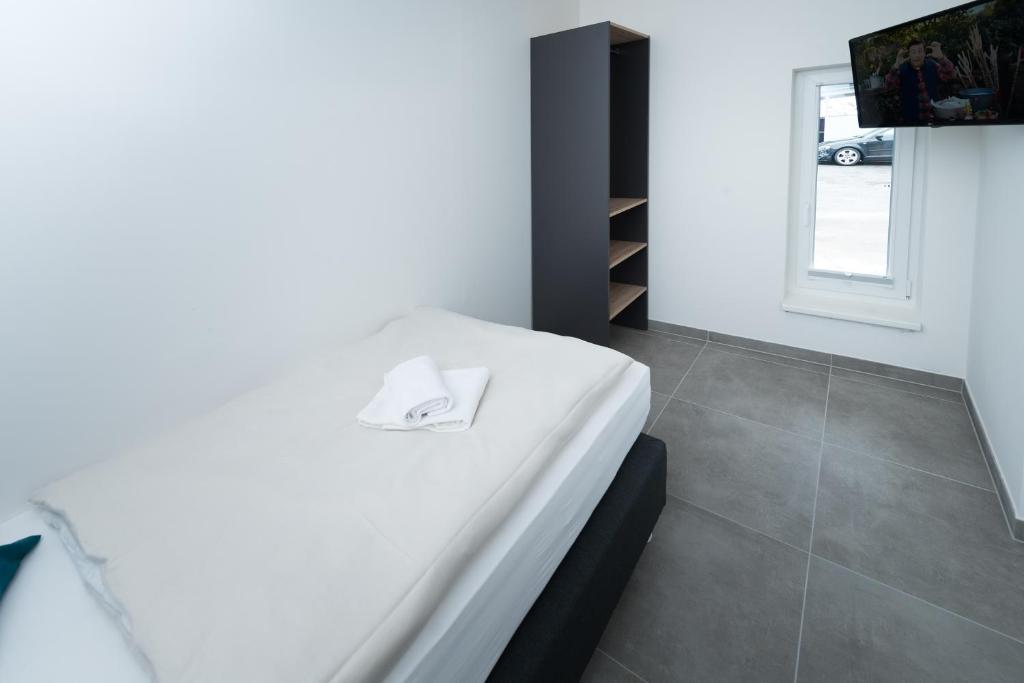 Postel nebo postele na pokoji v ubytování MOTEL24seven