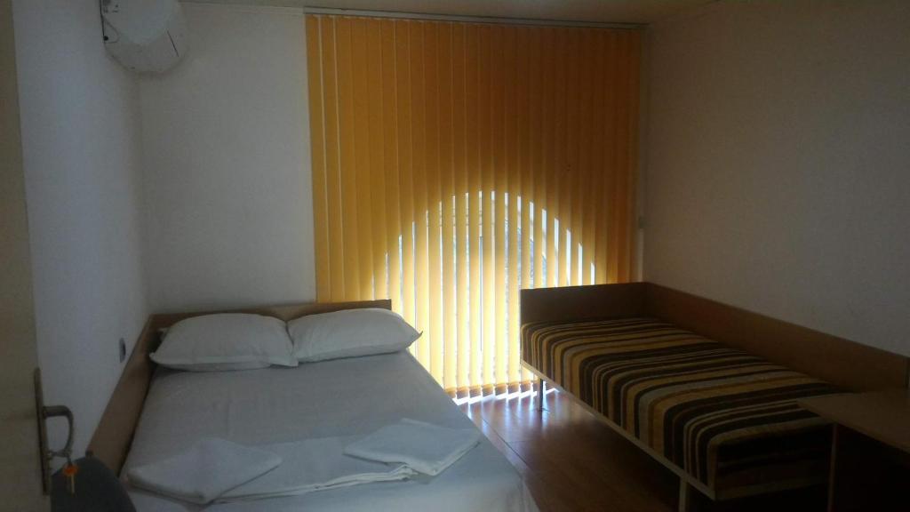 Postel nebo postele na pokoji v ubytování Hostel Ruschuk
