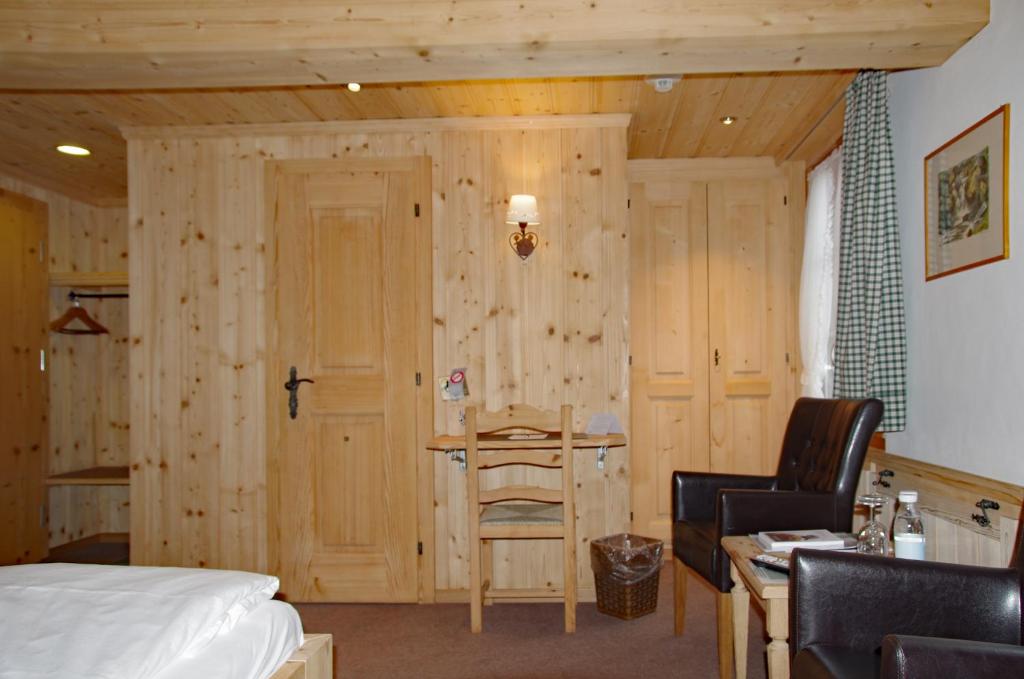 Postel nebo postele na pokoji v ubytování Posthotel Rössli