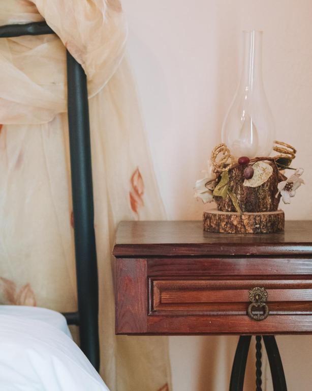 Posteľ alebo postele v izbe v ubytovaní Evilion Traditional Inn