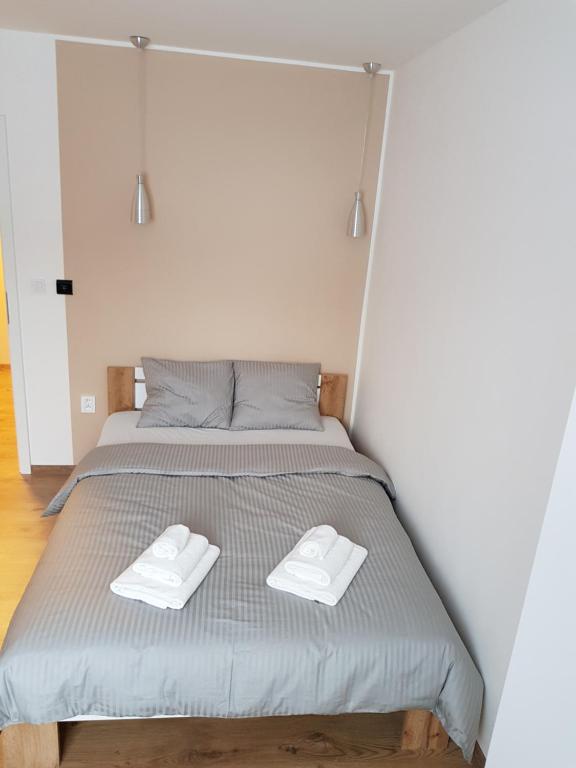 Postel nebo postele na pokoji v ubytování Apartmány Pec pod Sněžkou