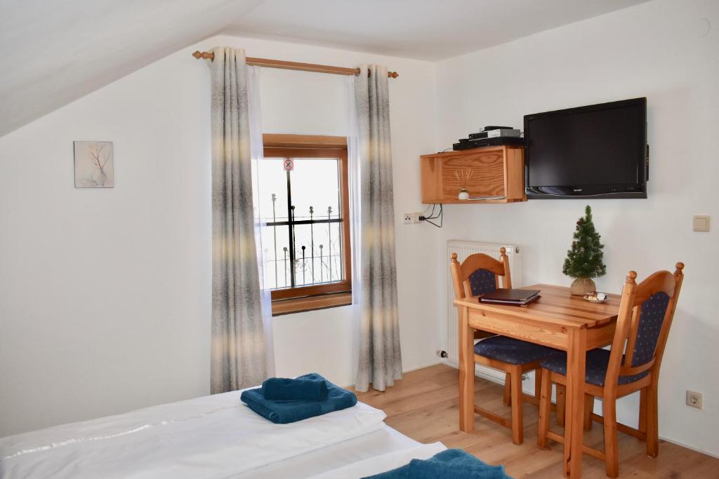 TV a/nebo společenská místnost v ubytování Haus Thomas