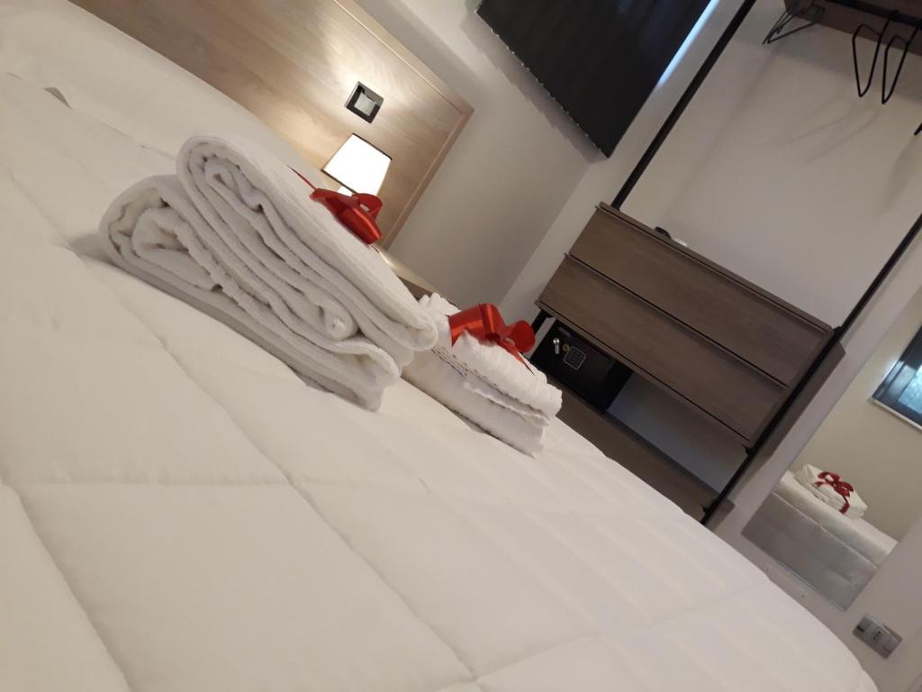 Postel nebo postele na pokoji v ubytování Cuoreverde Matera